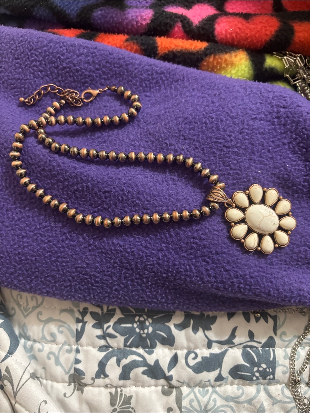 Bronze Beaded Necklace with Cream Floral Pendant
